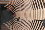 Installing ribs on wooden guide boat