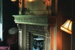 Mantle with scrolls