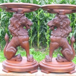 A pair of lions carved in solid walnut. Later, Marble tops were added to these bedside tables .